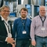 Picture of customers Wintershall in front of hydrocarbon calibration rig at Endress+Hauser Flow